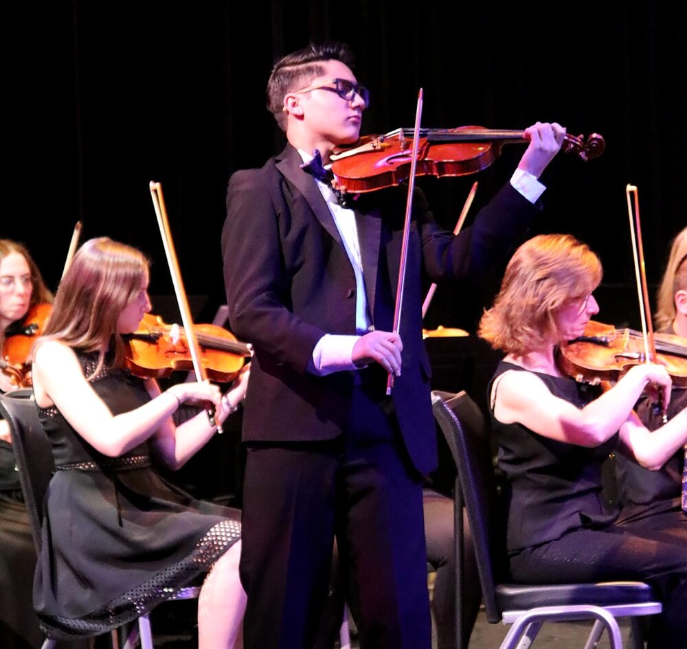 BMP19139-141 Young violinist performs concerto with the Aurora Symphony Orchestra