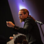 Aurora Symphony Orchestra-16_1920w a conductor looking expressive