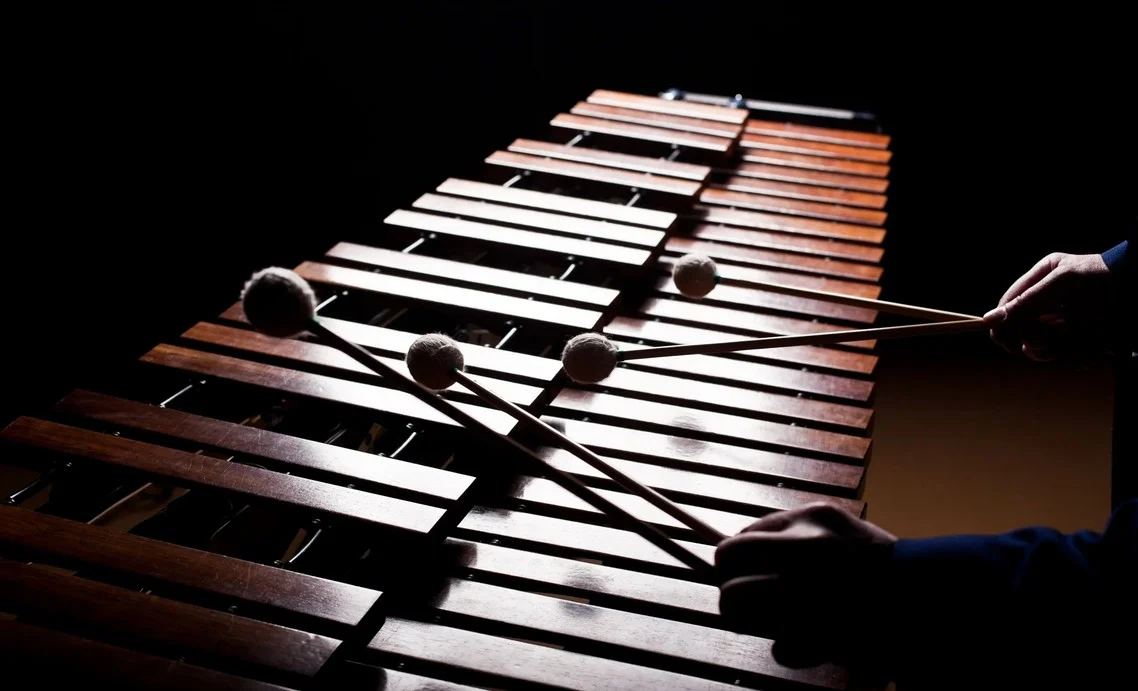 Photo of Marimba being played with 4-mallets